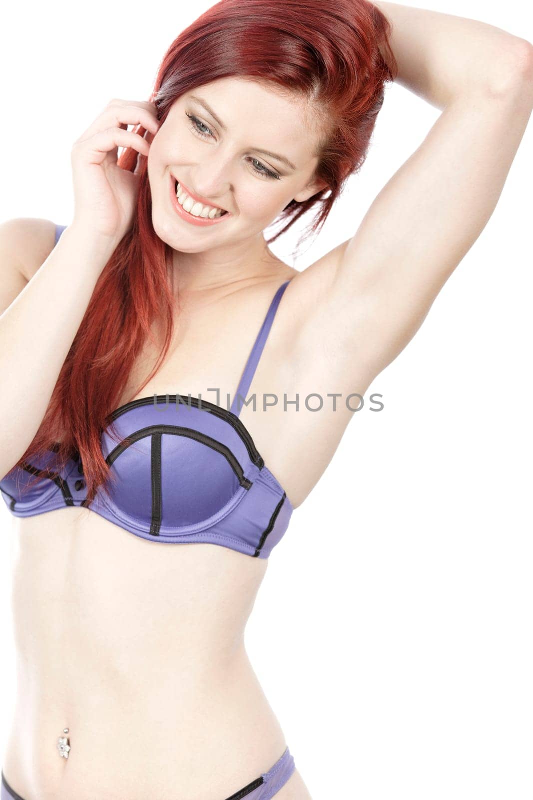 Attractive young woman in her underwear posing and having fun