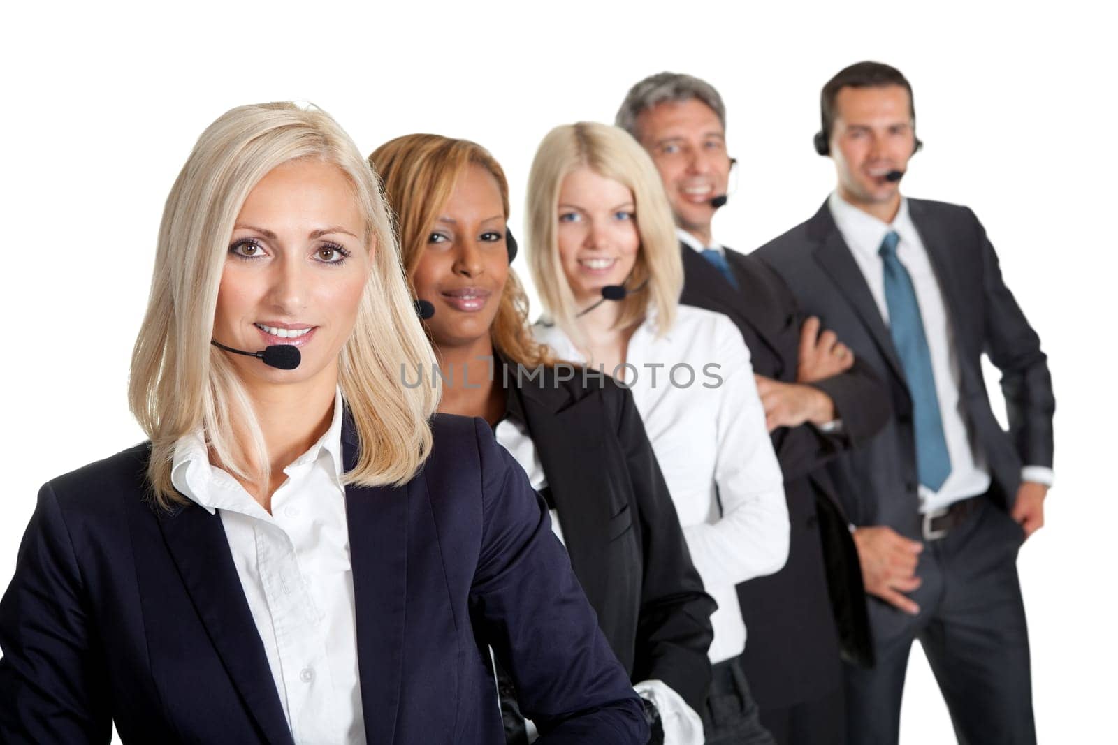 Successful business team with headset on standing in a row against white background