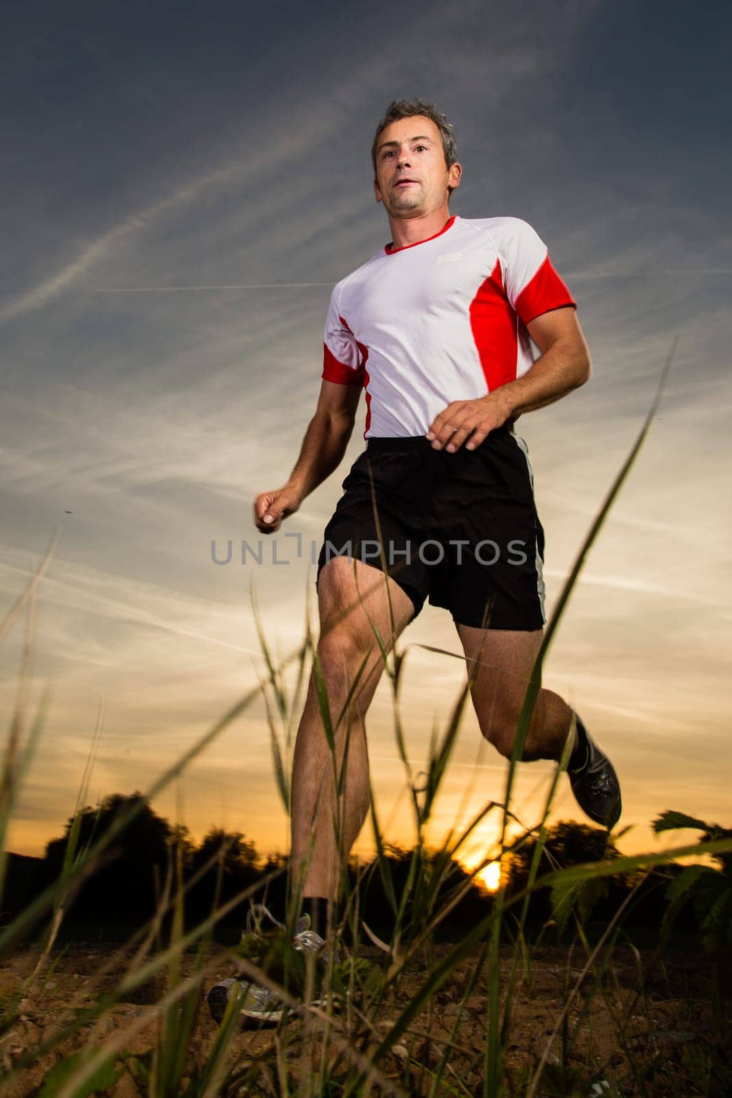 Joggers before sunset