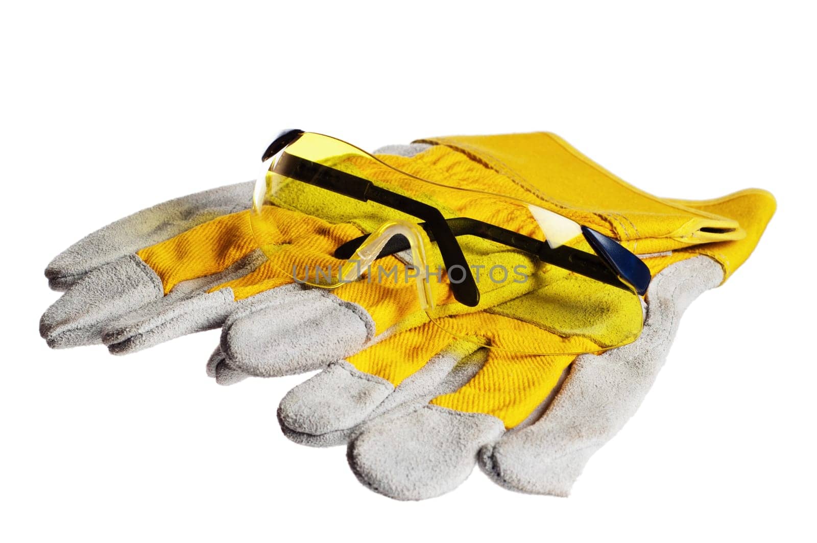 Yellow working goggles and gloves, it is isolated on white
