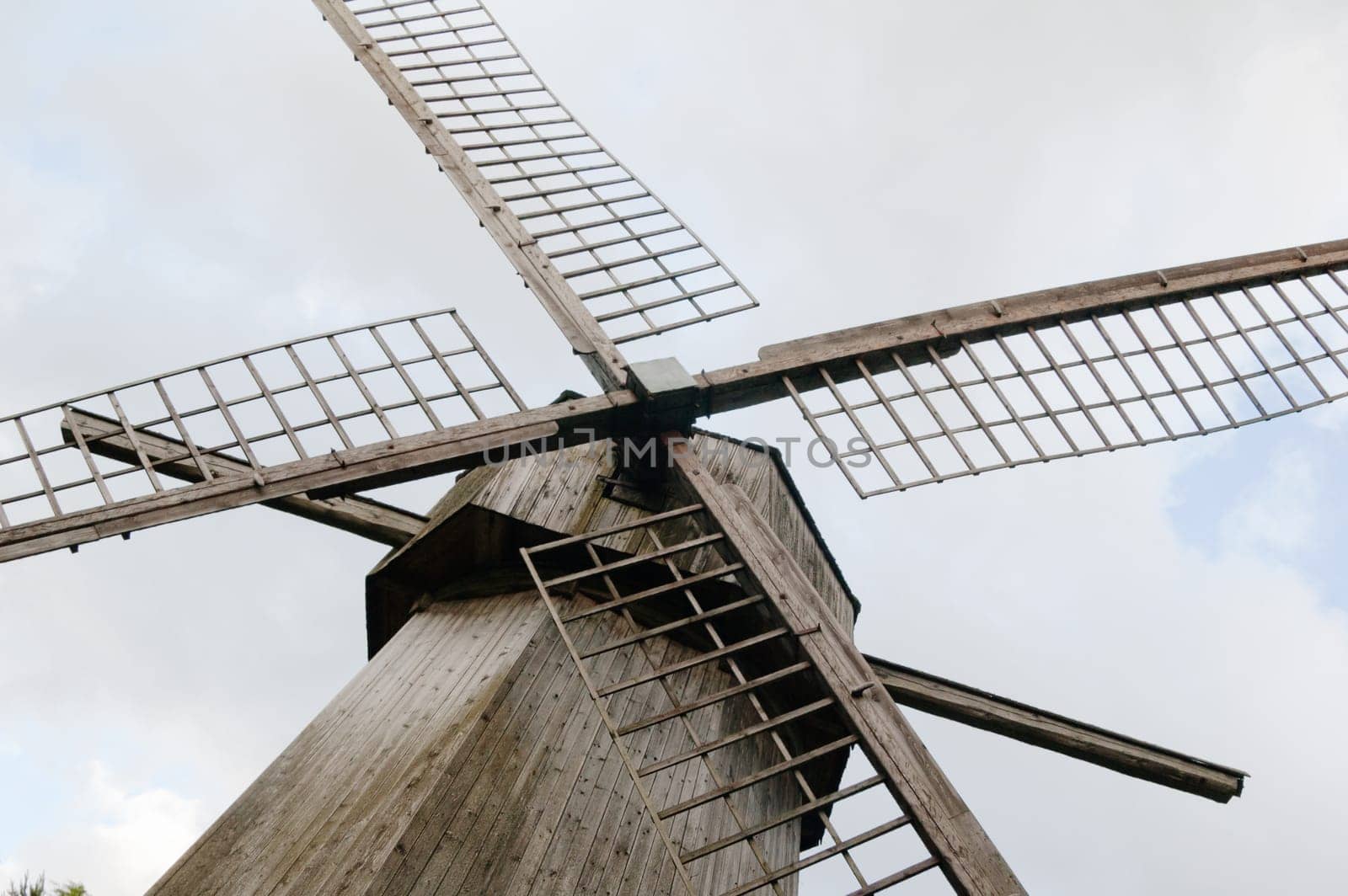 Blades of an old wooden windmill, a close up