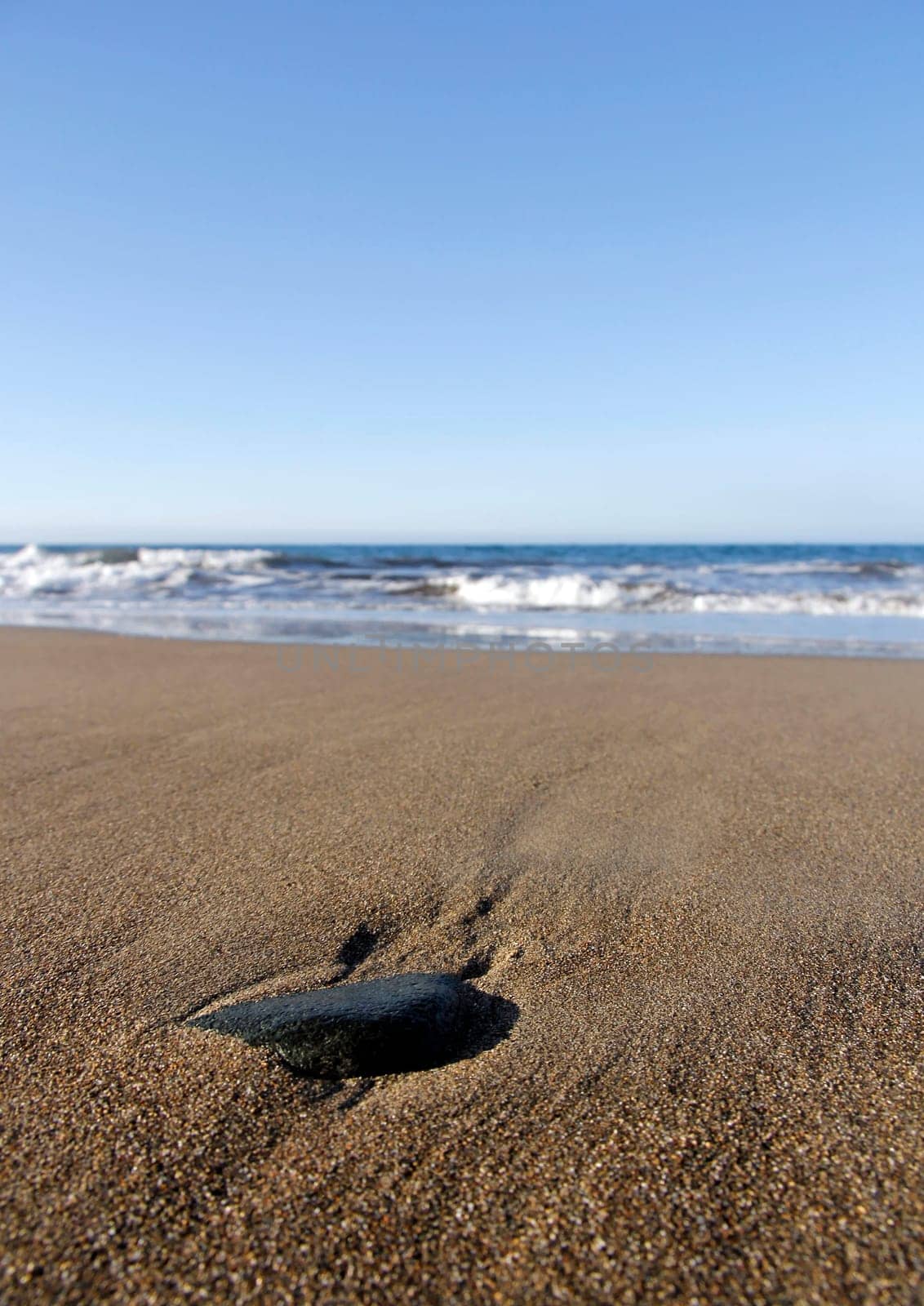 The Black Stone on the Beach