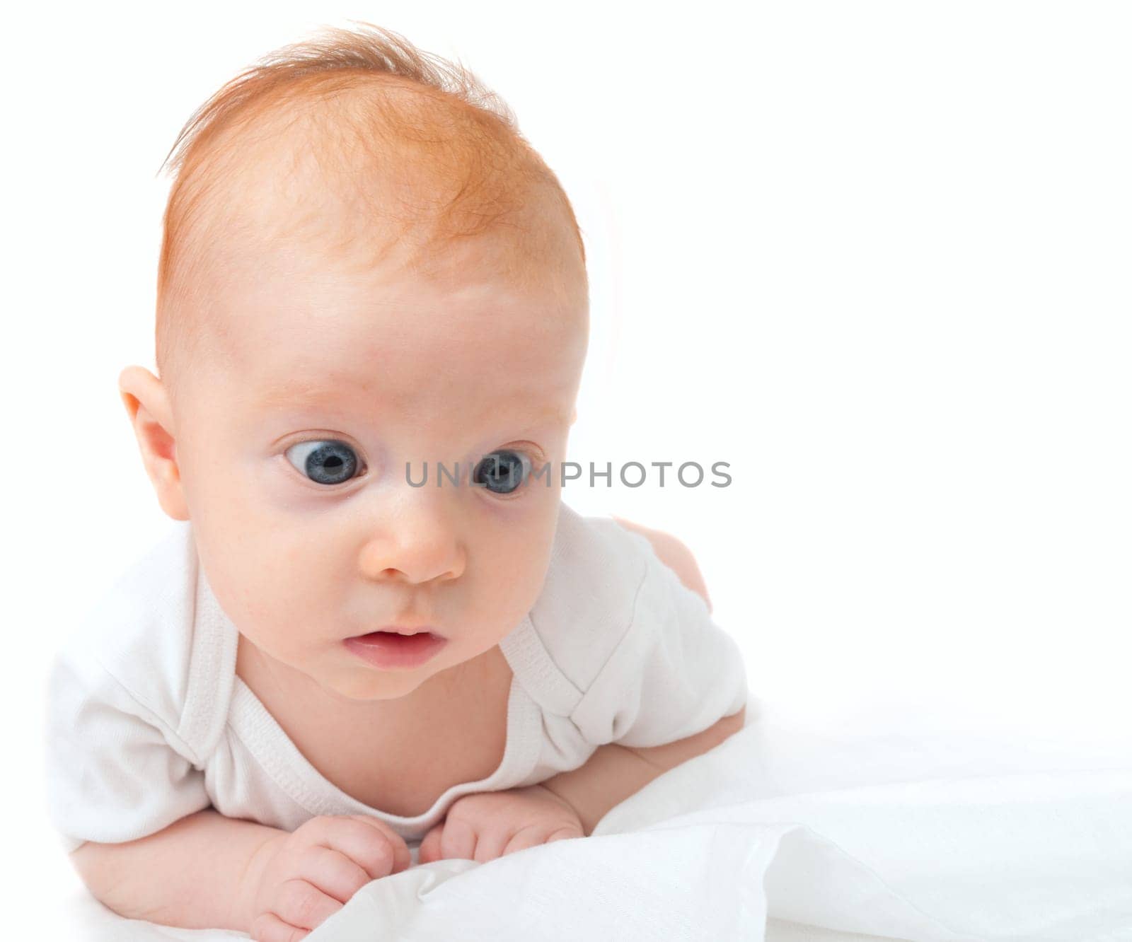 Baby Lying on Front on White Background