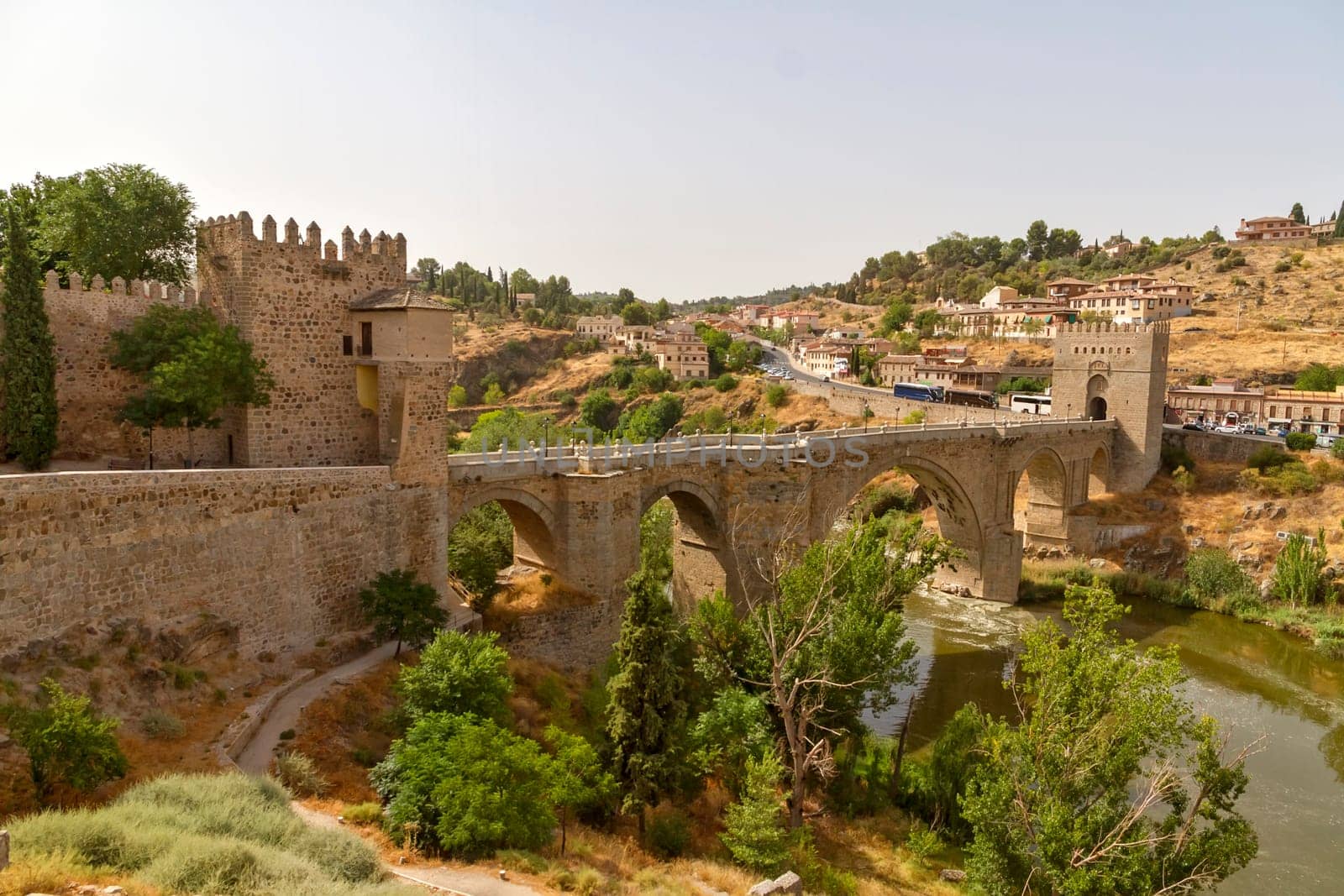 City of Toledo near the bridge Puente de Alcantara over River Tajo, Spain