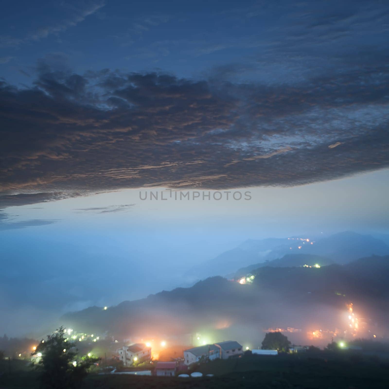 mountain valley with beautiful cloud in the sky at dawn