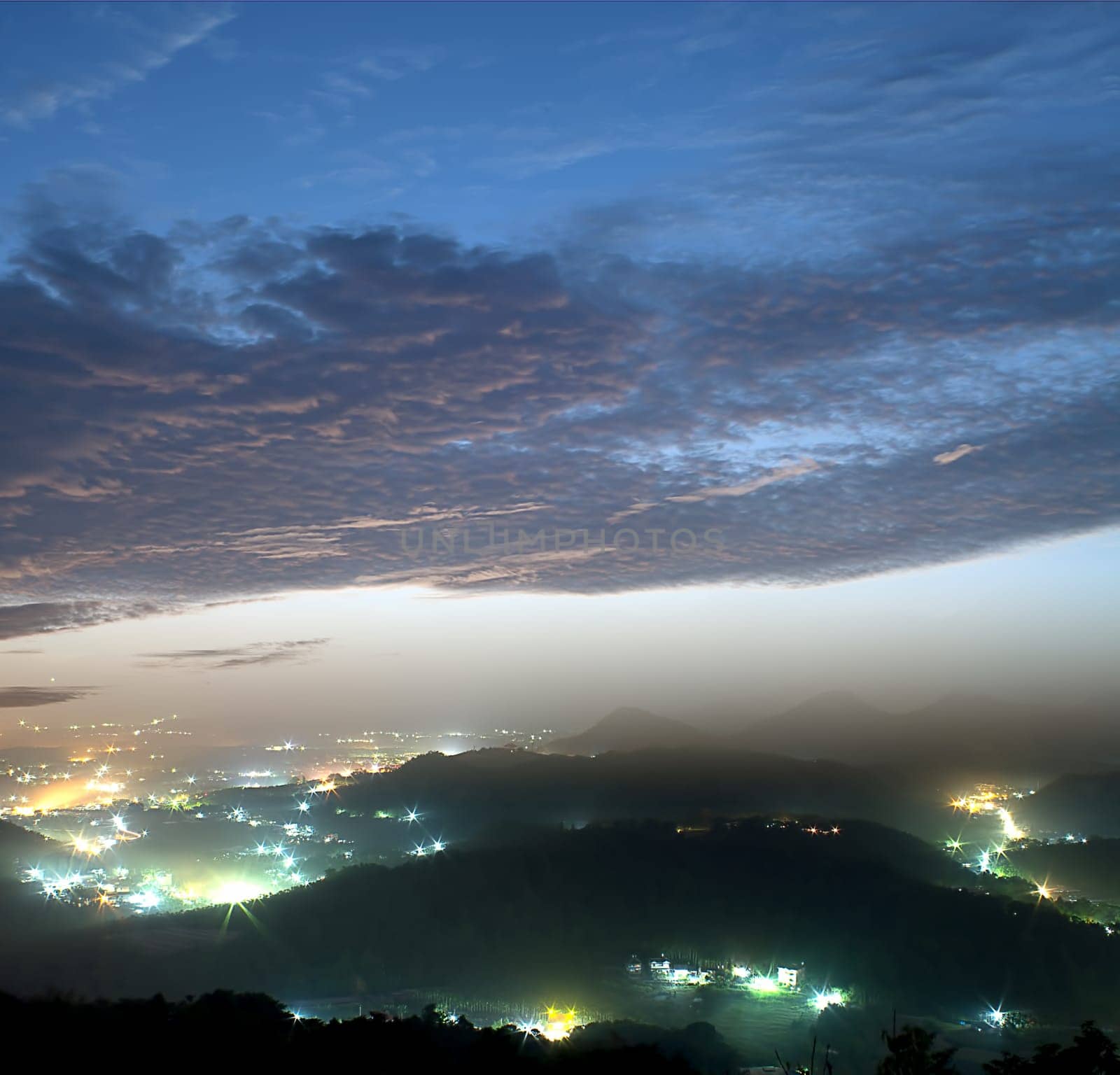 mountain valley with beautiful cloud in the sky at dawn