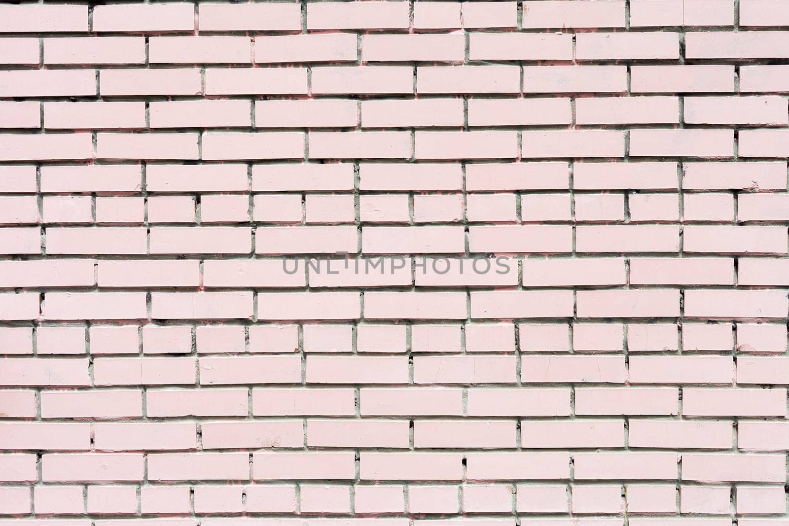 Grunge cracked pink painted brick wall high detailed
