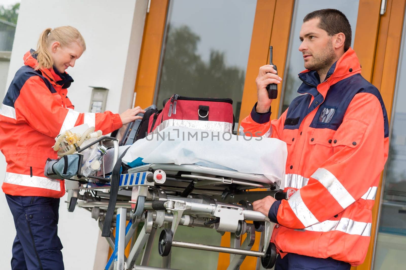 Emergency paramedics radio call ambulance house door visit doctor