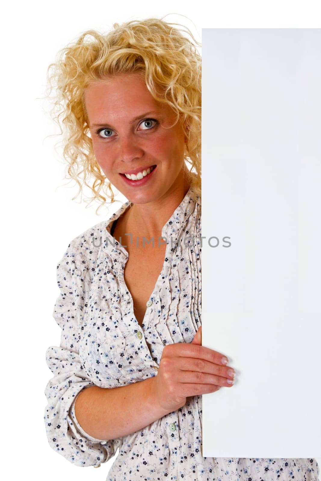 Attractive woman holding billboard isolated on white background