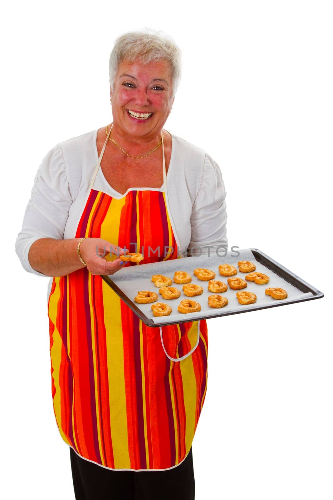 Senior woman with homemade cookies - isolated on white background