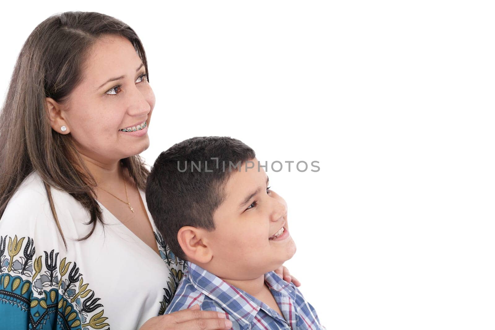 Happy mother with orthodontics and son isolated on light background