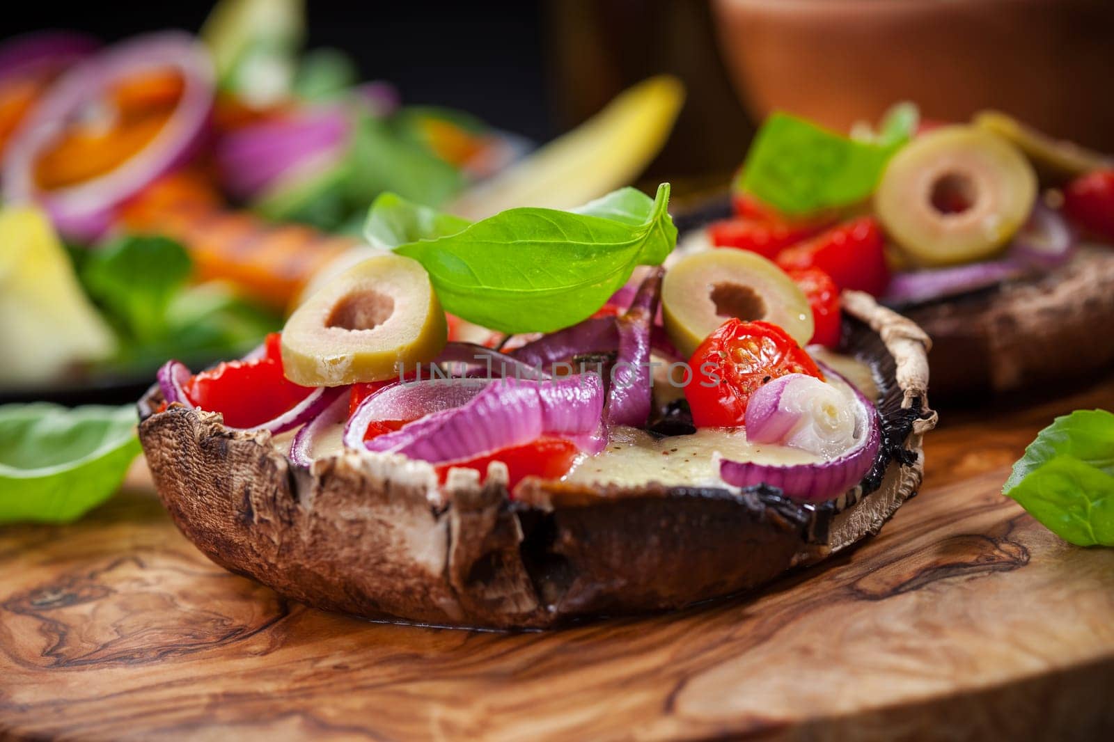 Giant Portobello mushrooms stuffed with mozzarella and tomatoes