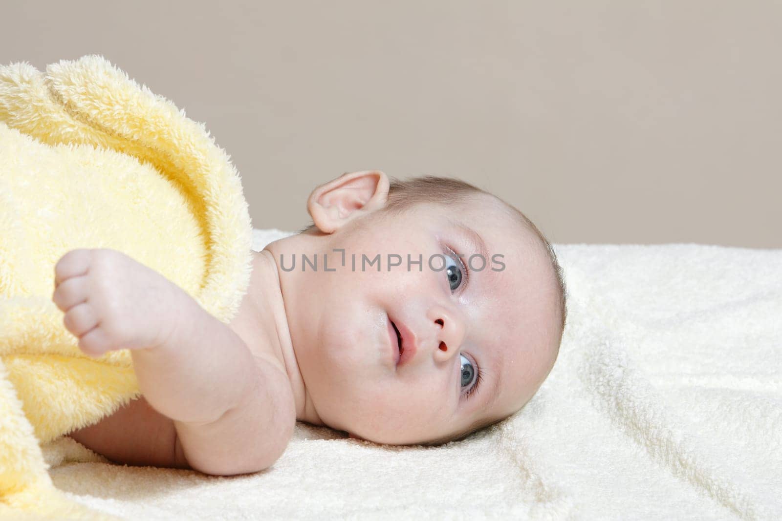 Newborn - close-up focus baby boy with yelow blanket