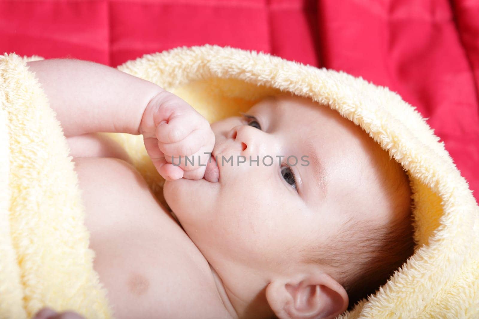 Newborn - close-up focus baby boy with yelow blanket