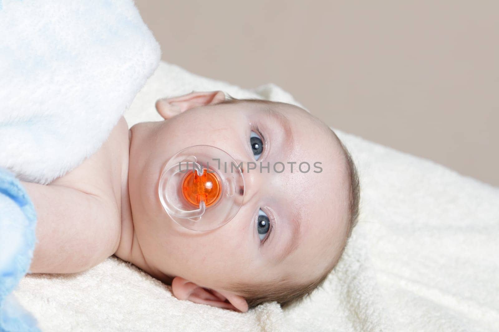 Newborn - close-up focus baby boy with pacifier