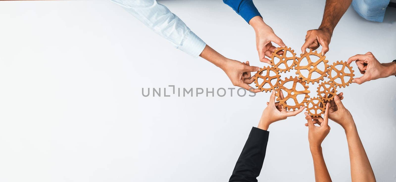 Top panorama banner of business team joining cogwheel in circular together symbolize successful group of business partnership and collective teamwork in workplace with productive efficiency. Prudent