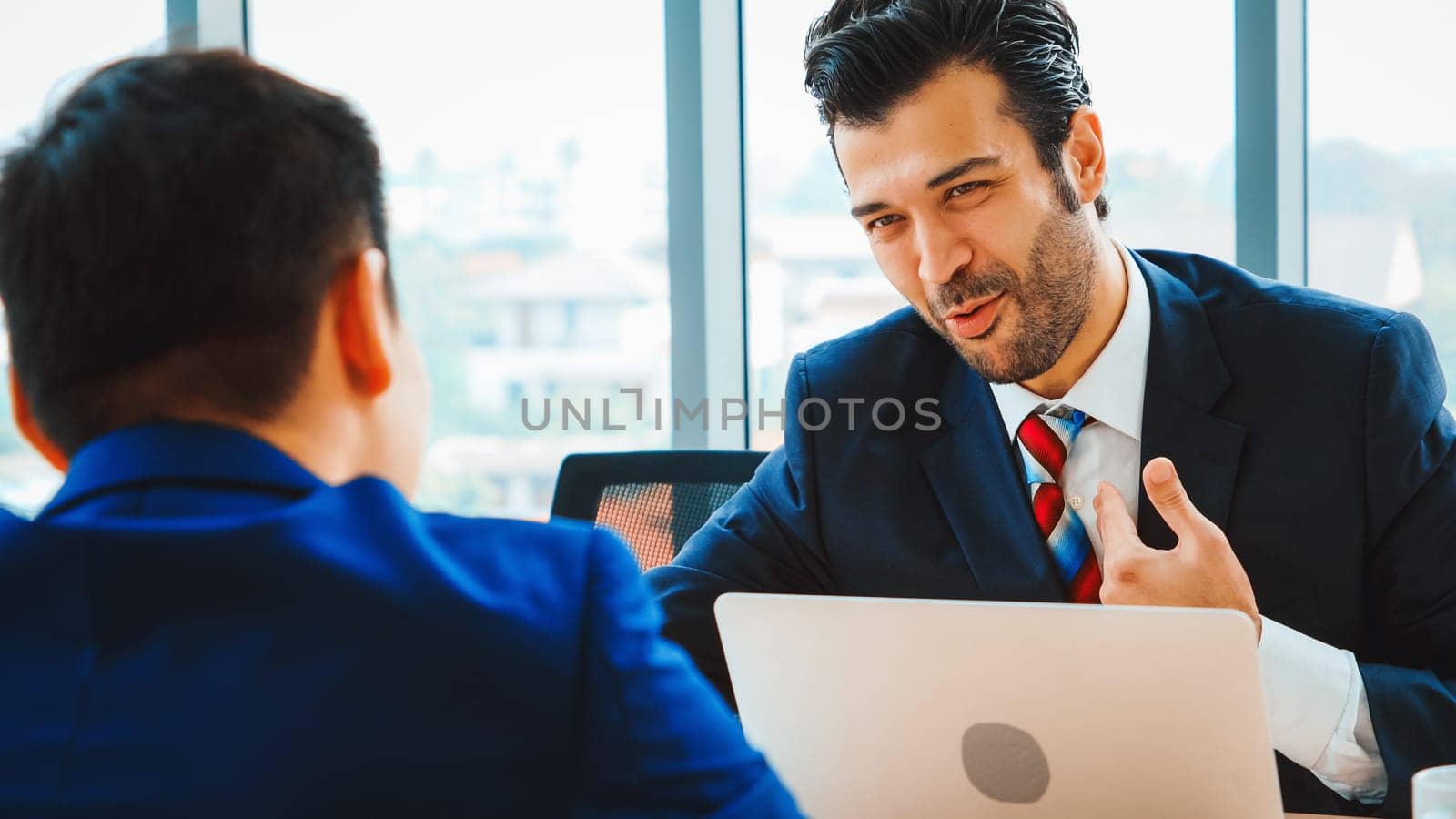 Job seeker in job interview meeting with manager and interviewer at corporate office. The young interviewee seek for professional career job opportunity . Human resources and recruitment concept. Jivy