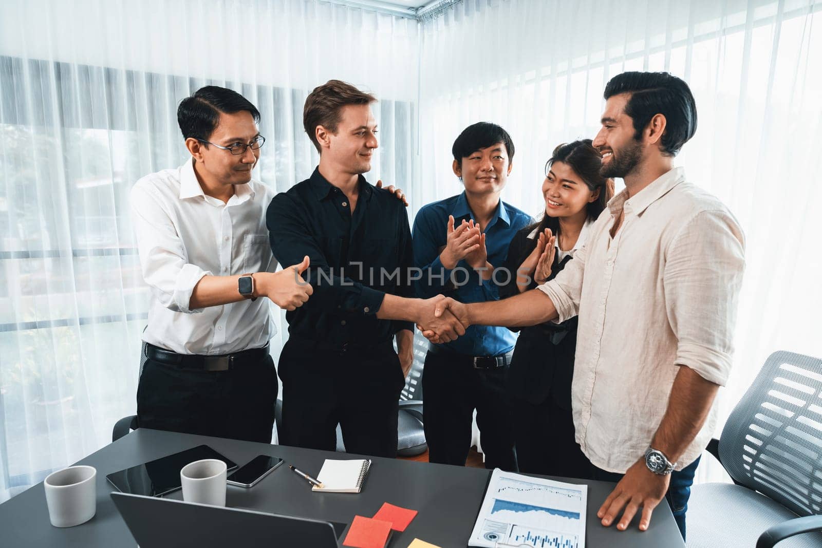 Group of diverse office worker employee shake hand and working together. Prudent by biancoblue