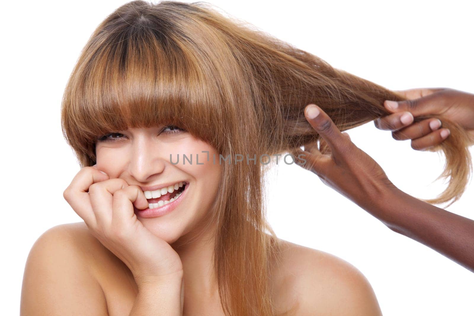 Beautiful happy woman getting her hair done