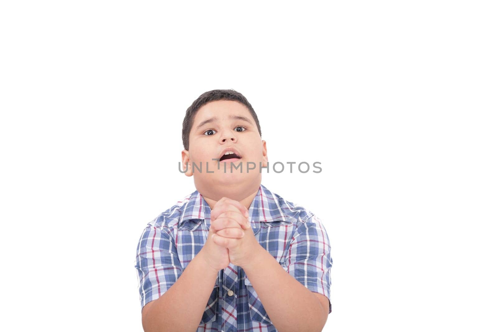 Hands together in prayer with divine aura