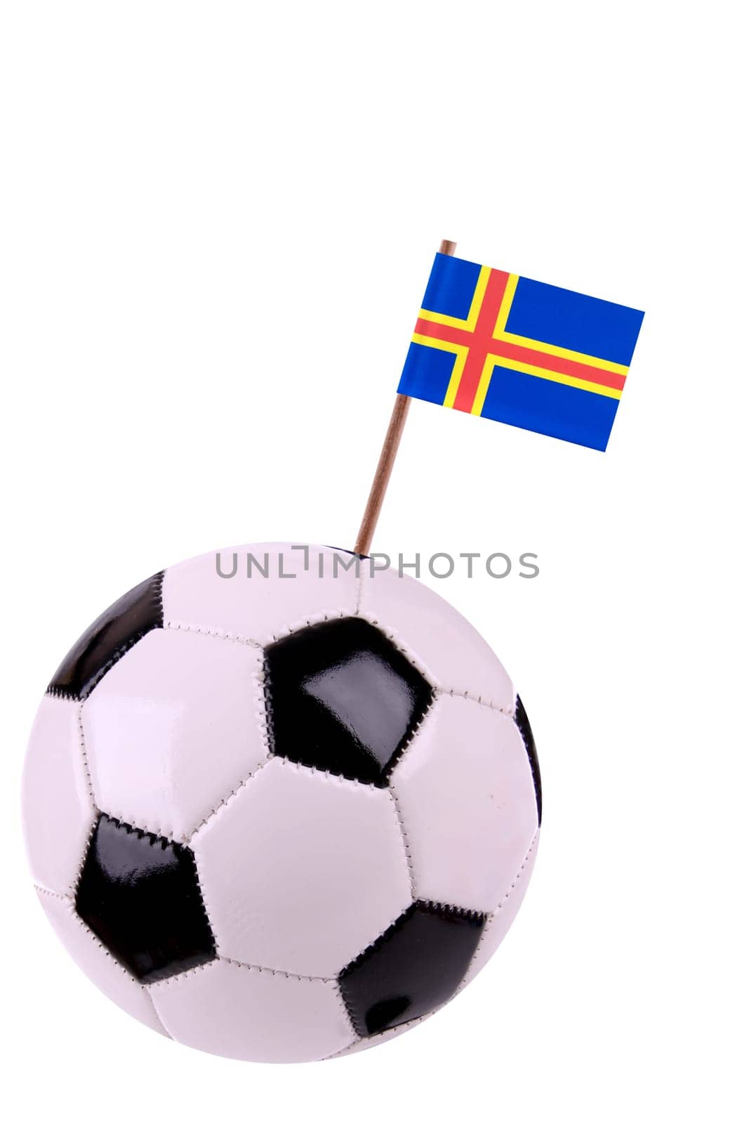 Soccer ball or football decorated with a small national flag on a tooth stick