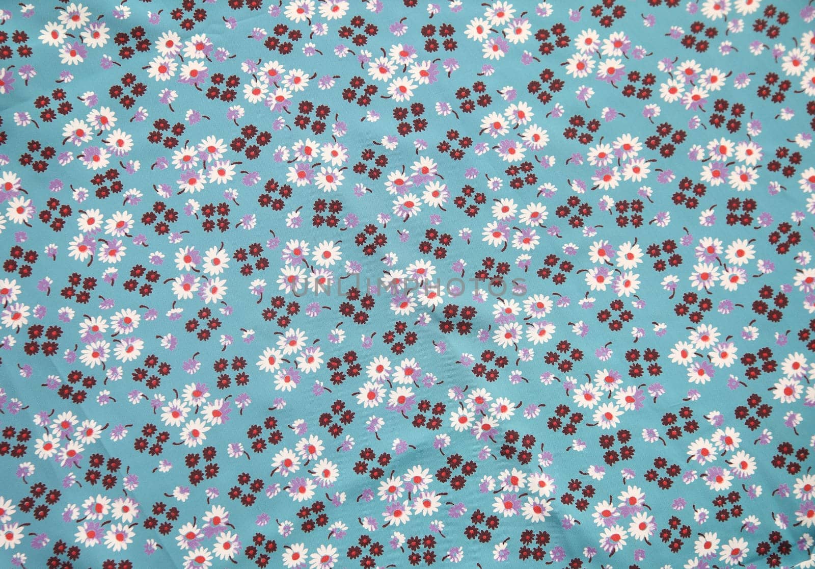vintage cloth with flower print in blue, brown, lilac and orange