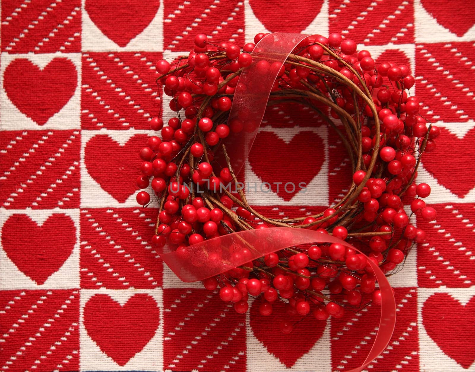 wreath with red berries and hearts