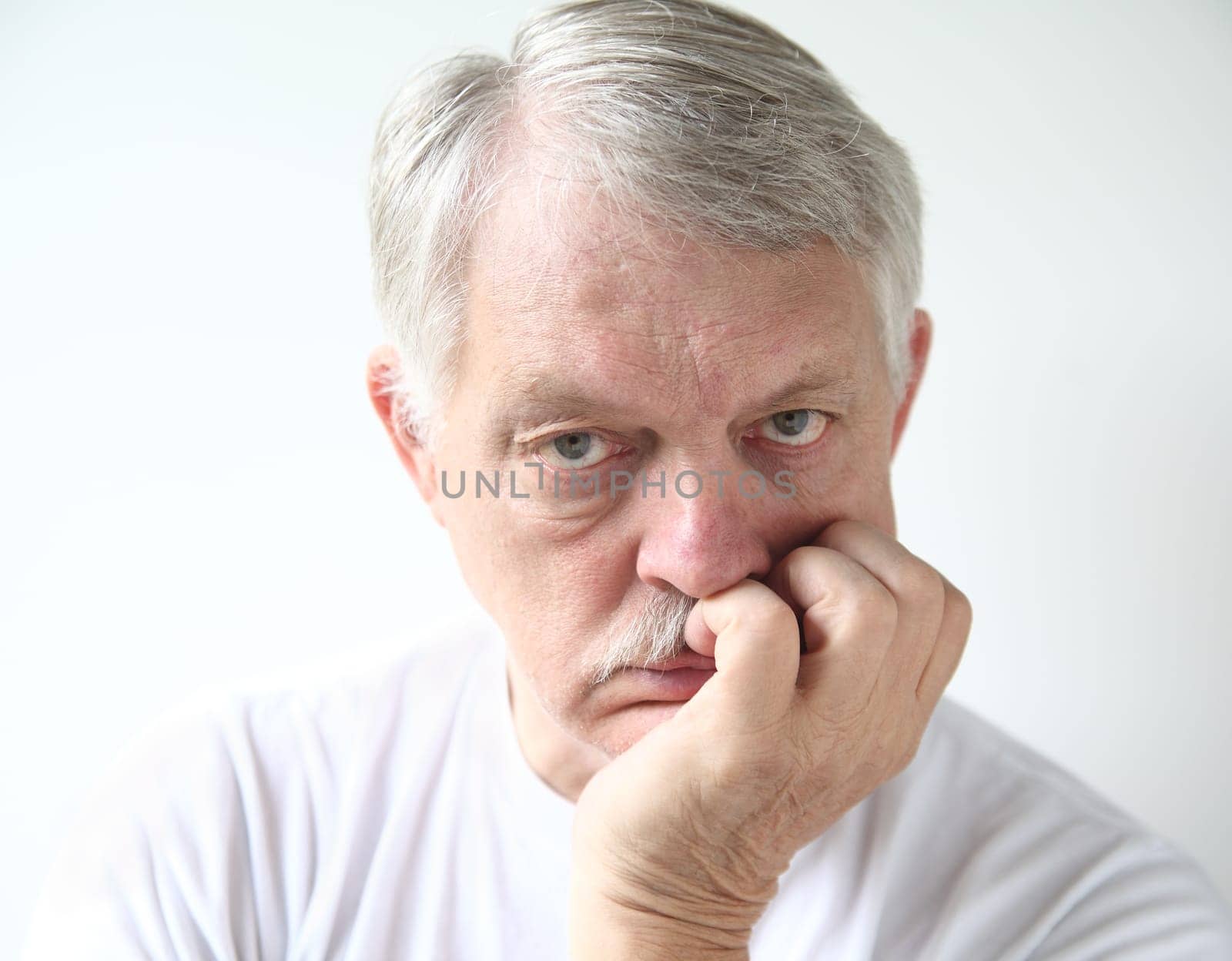 man with bored expression