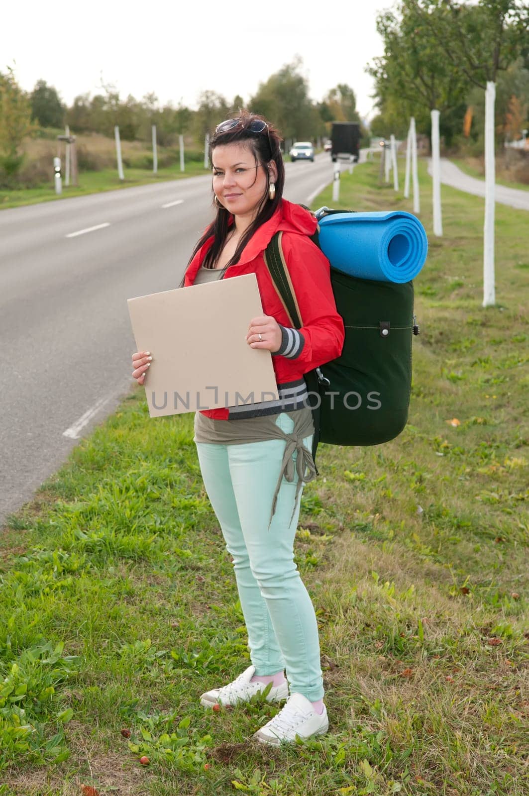 Hitchhiker with sign