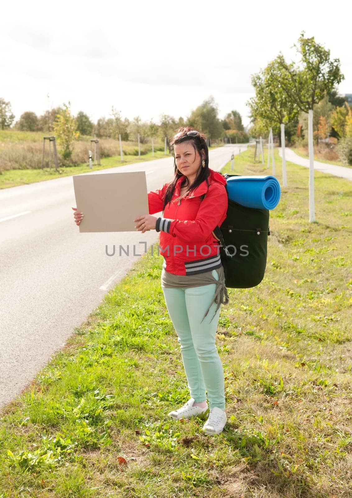 Hitchhiker with sign