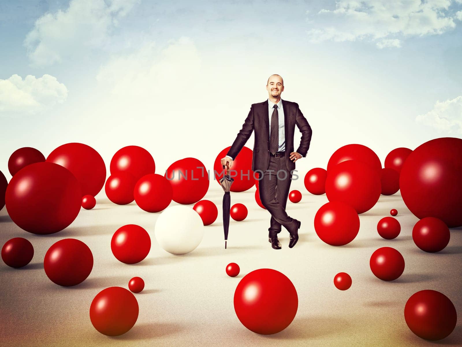standing man and lots of red sphere