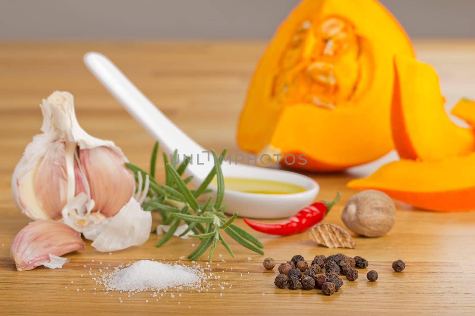 Spice Still Life with Pumpkin on Wooden Plate