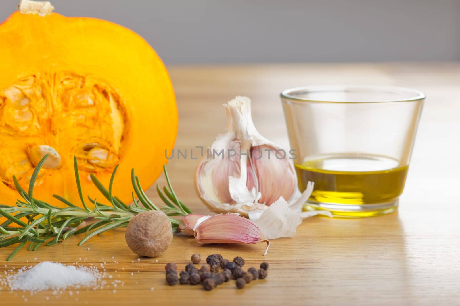 Spice Still Life with Pumpkin on Wooden Plate