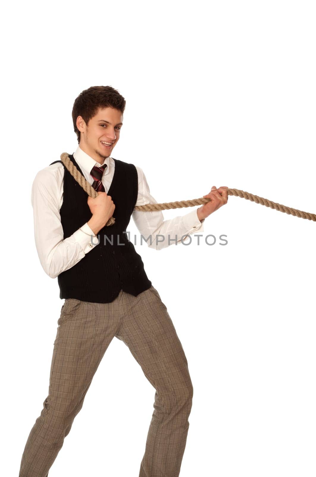strong-willed man pulling of a rope and wins as a symbol of success