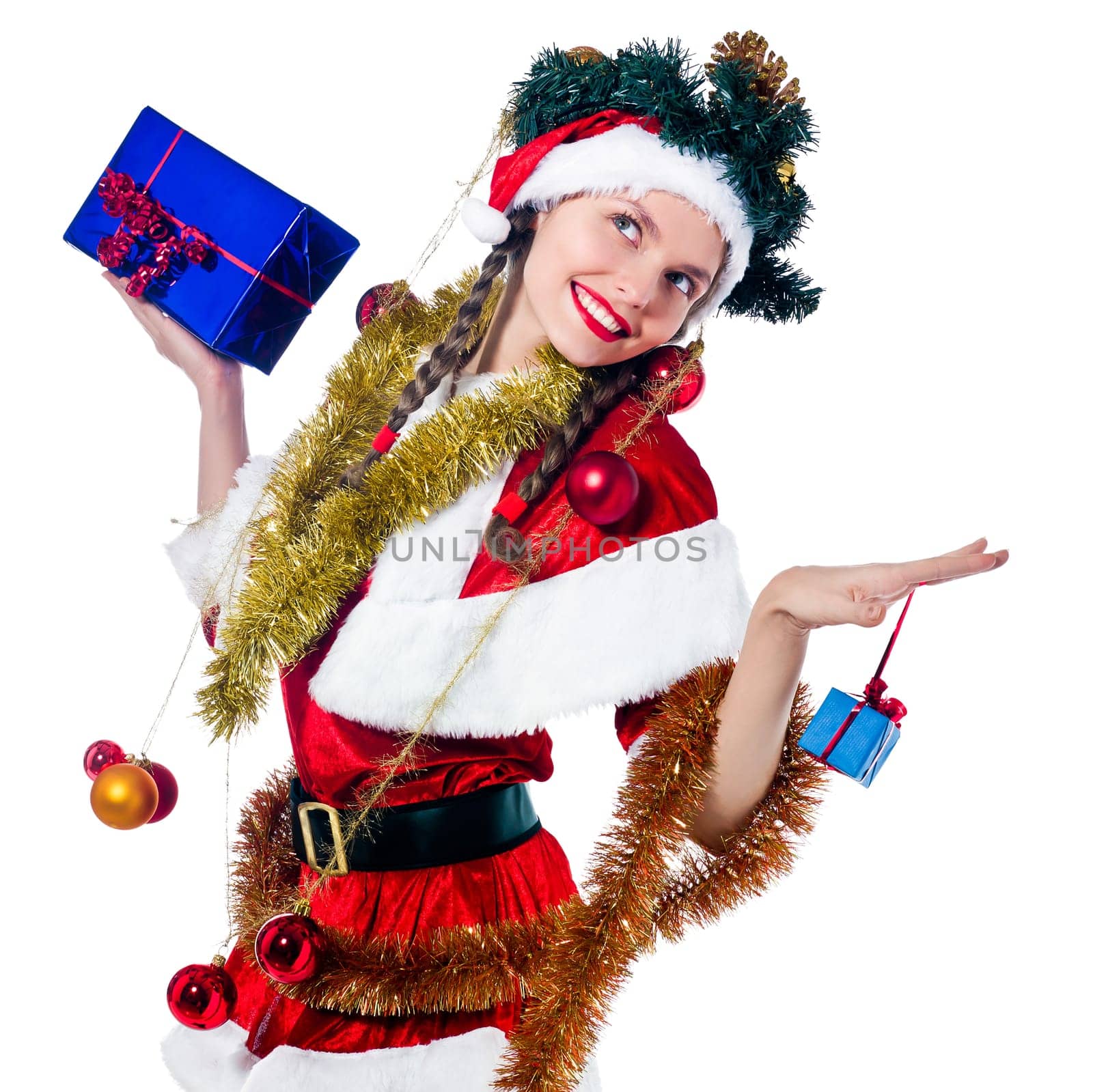 one woman dressed as santa claus holding presents gifts as christmas tree on studio isolated white background