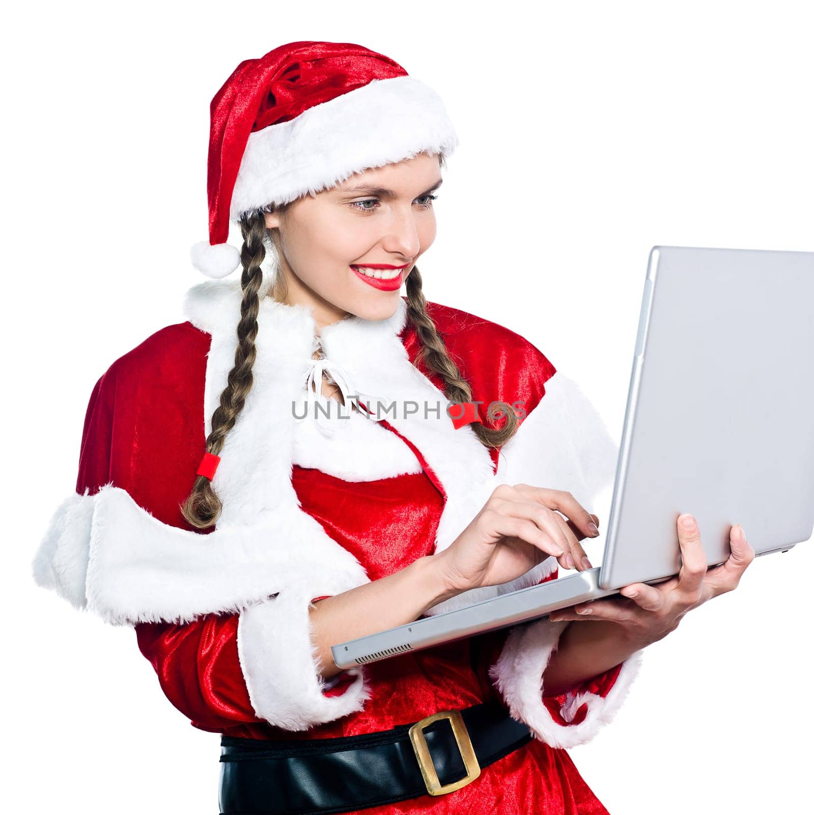 one woman dressed as santa claus christmas computing laptop computer on studio isolated white background