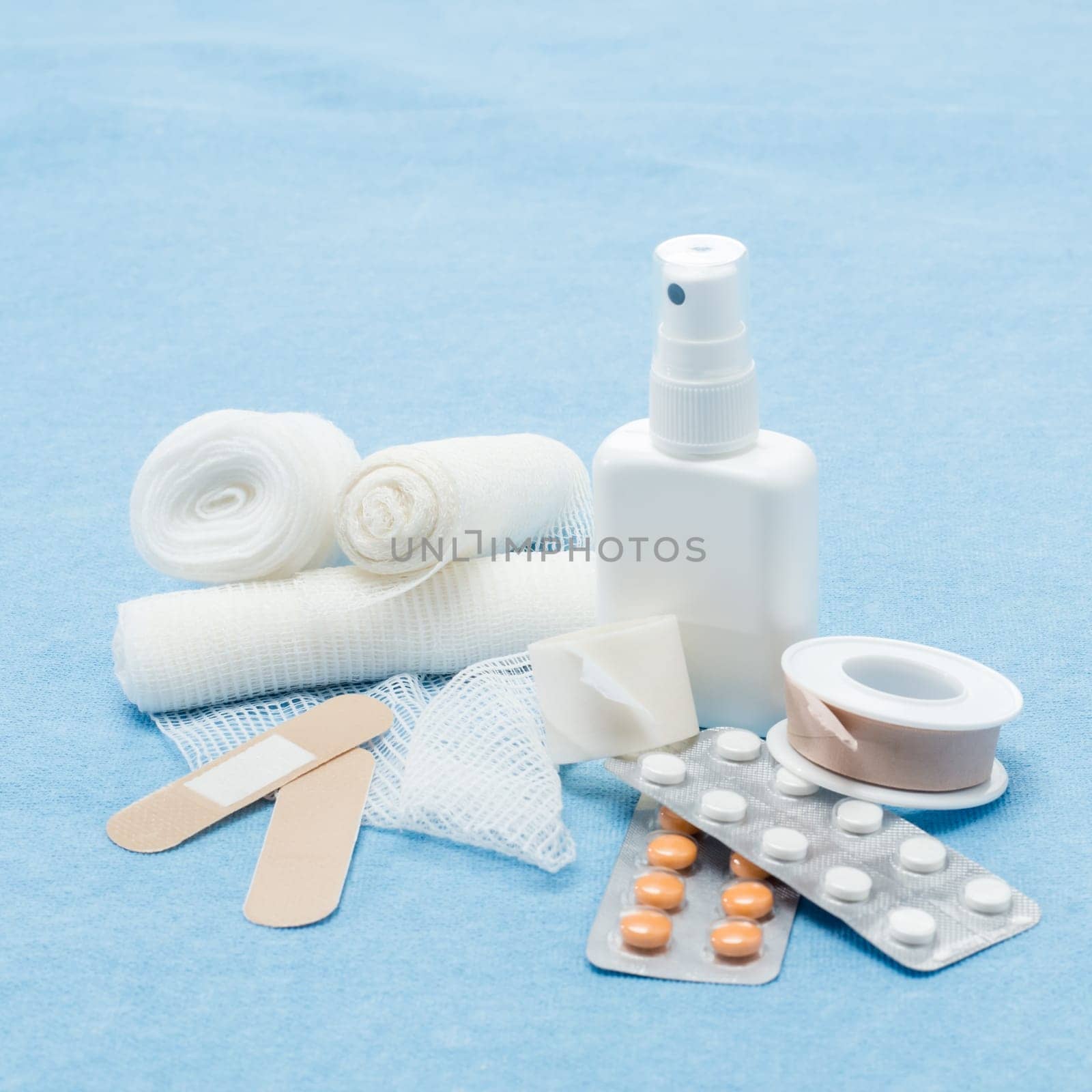 Content of First aid kit plasters, bandage and pills