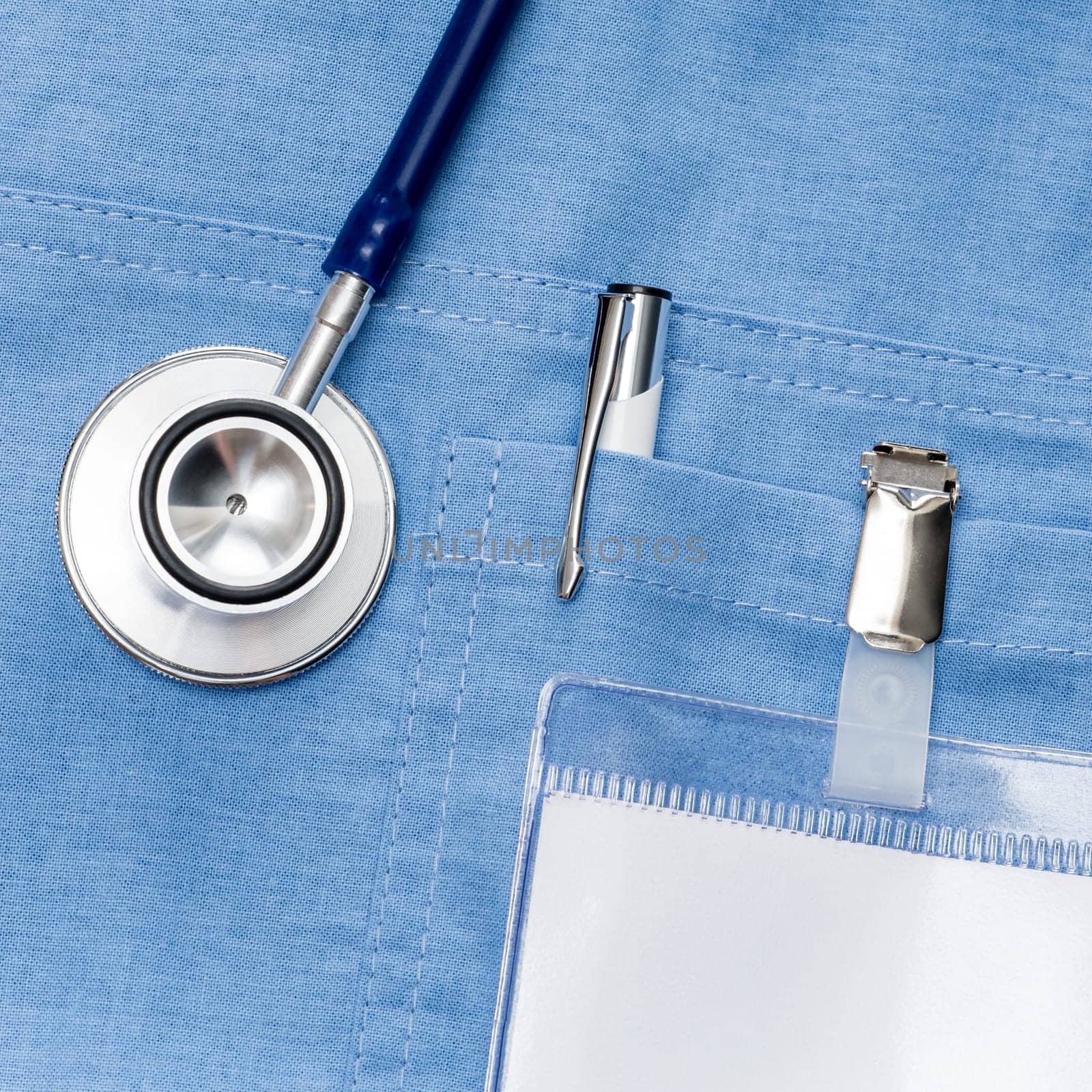 Doctor ID name tag on lab coat with stethoscope