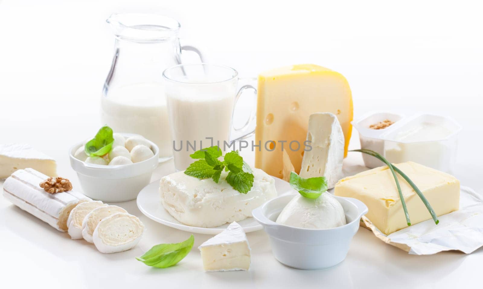 Assortment of dairy products on white background