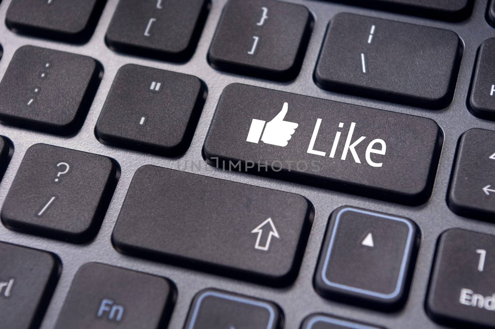 A like message on enter keyboard for social media concepts.