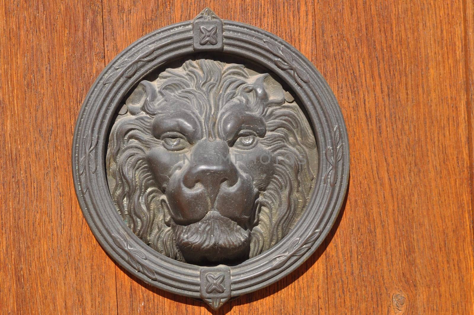Detail of an ancient Venetian mask in the city of Venice (Venezia) in Italy