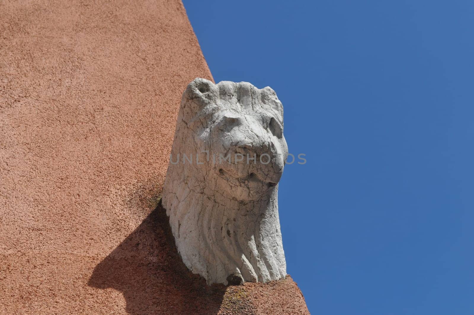 Detail of an ancient Venetian mask in the city of Venice (Venezia) in Italy