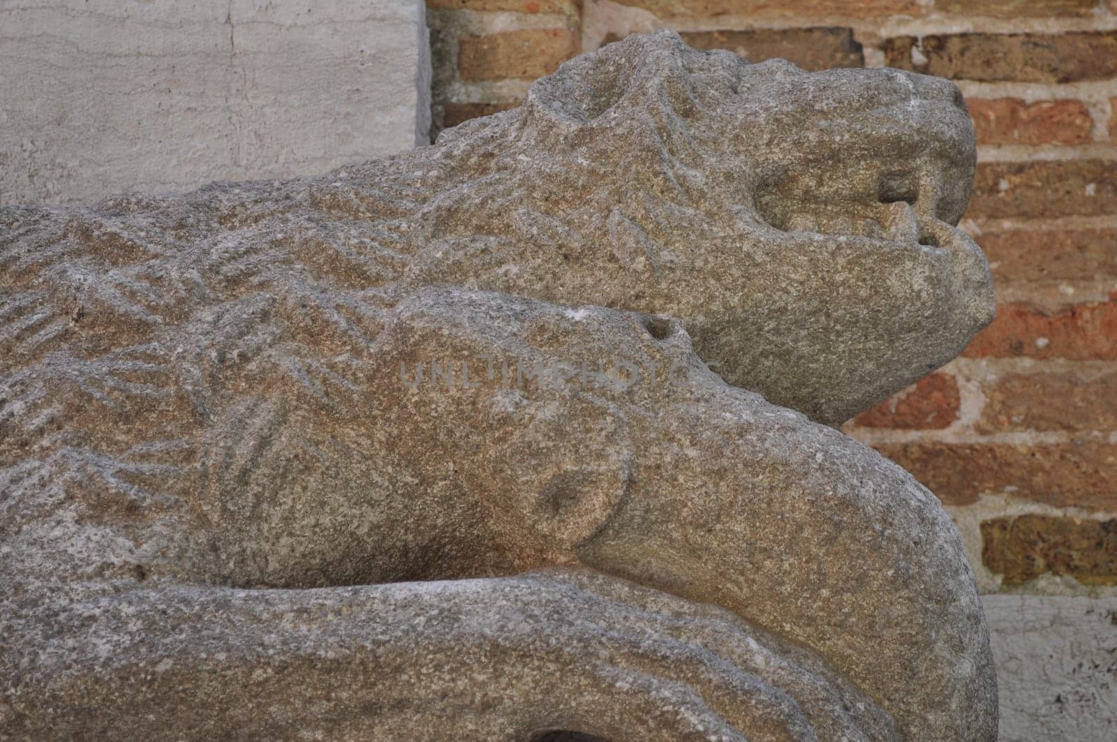 Detail of an ancient Venetian mask in the city of Venice (Venezia) in Italy