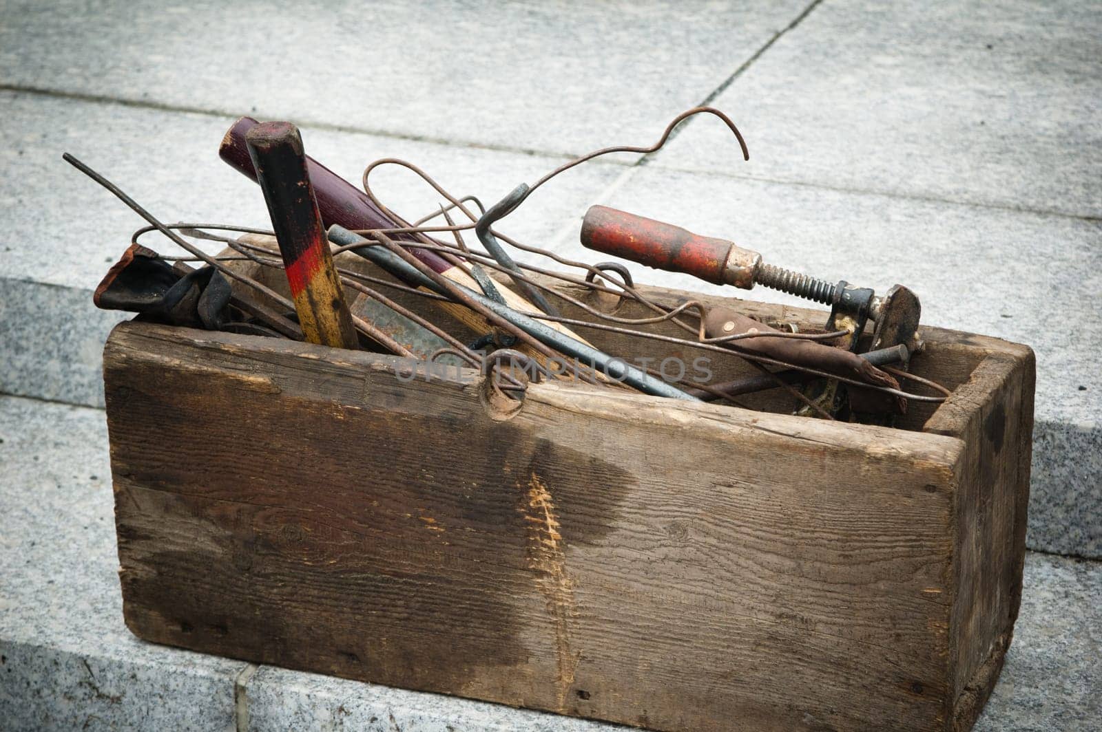 old wooden box with tools