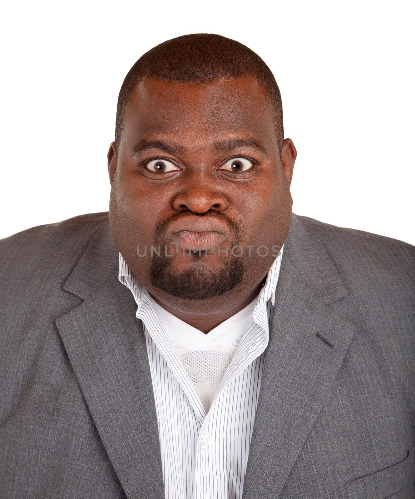 An African American businessman is angry about something.