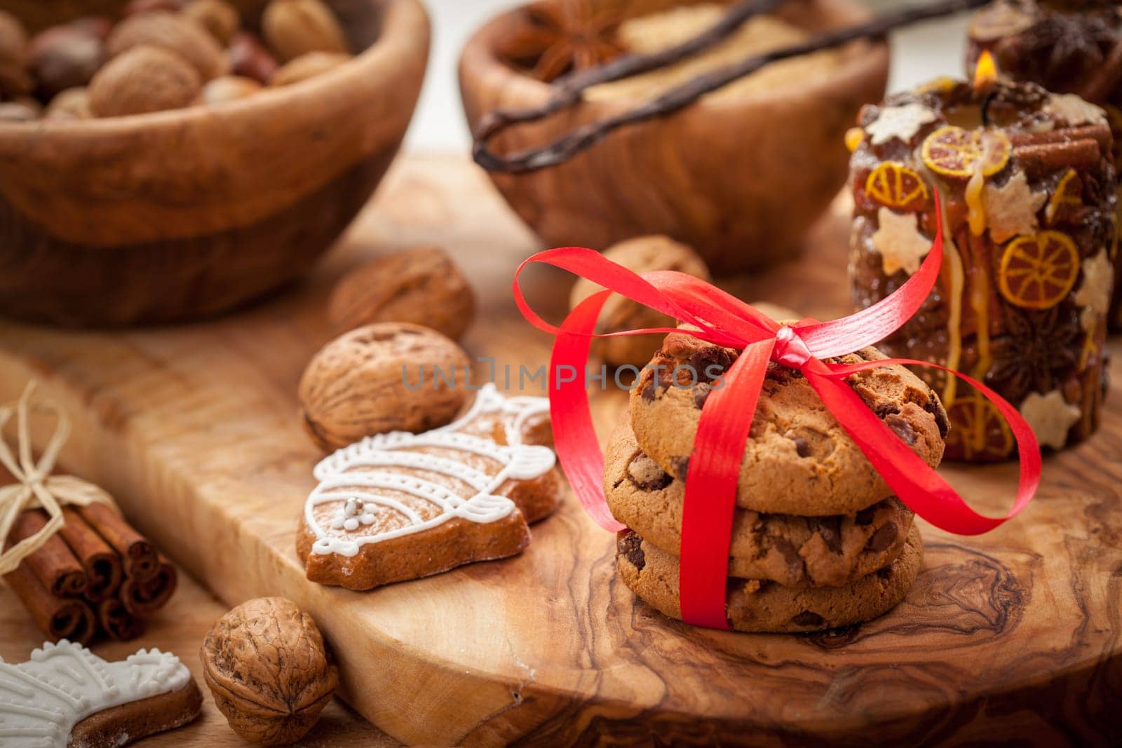 Christmas cookies with gingerbread and candles