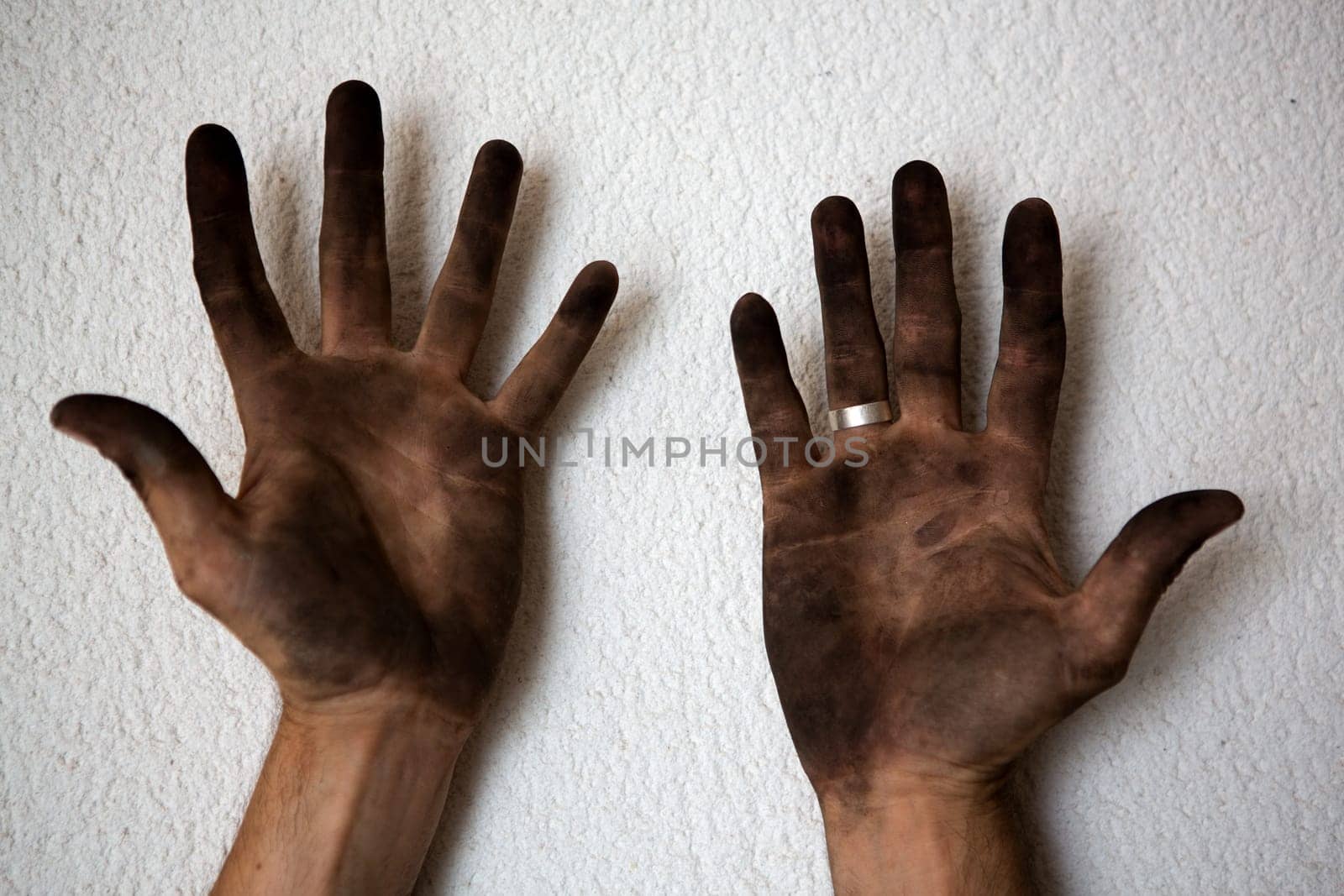 black dirty man hands open palms on white background