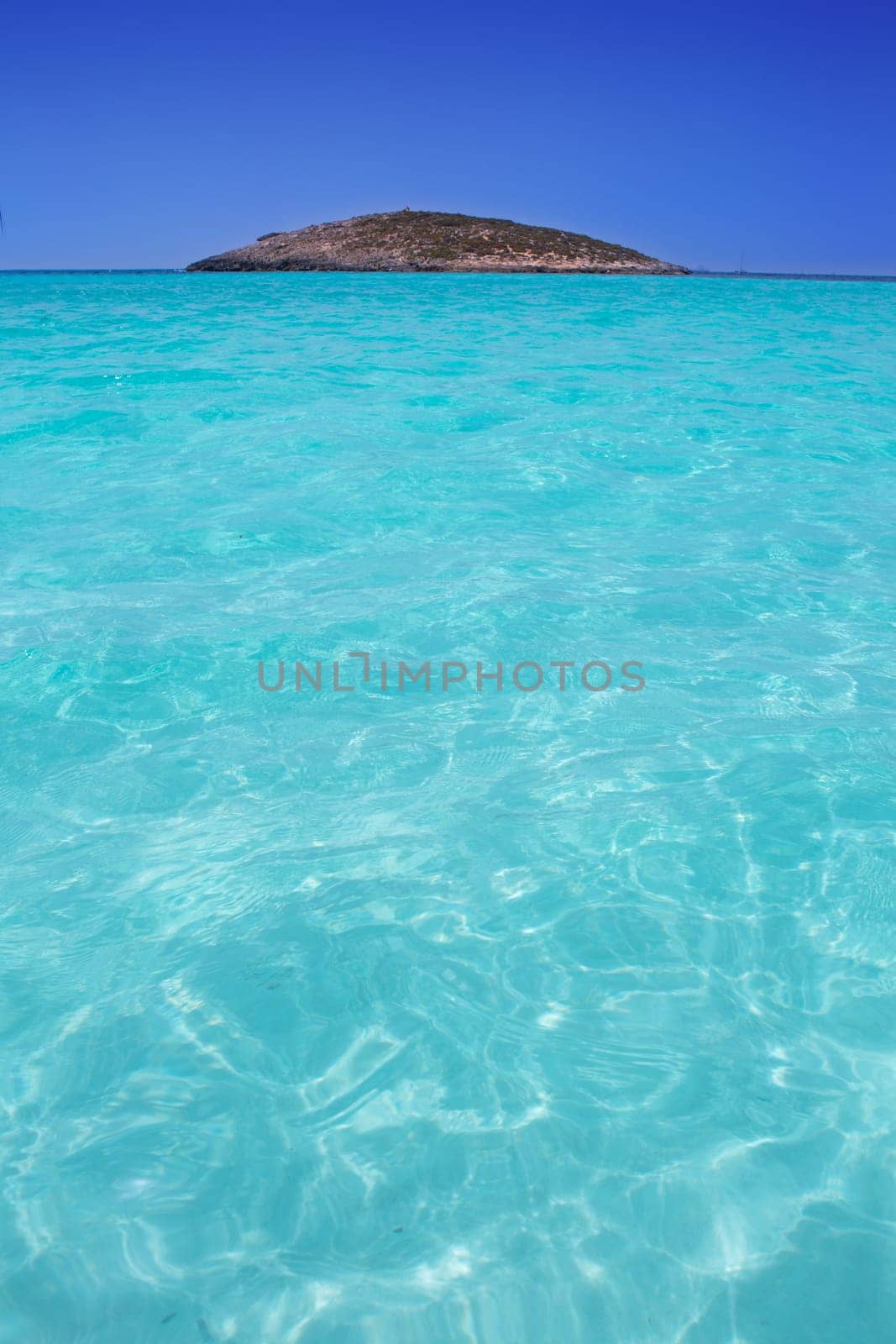 beach Illetas Illetes in Formentera near Ibiza with aqua water