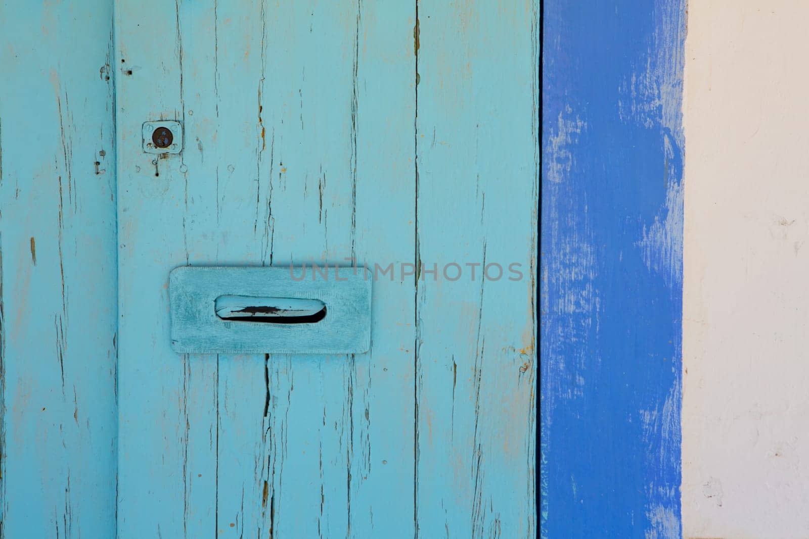 Blue and turquoise mediterranean door in Ibiza formentera