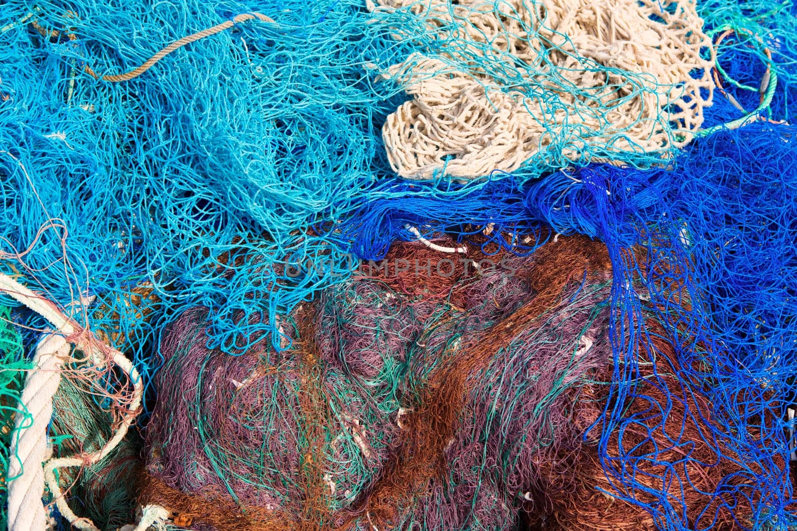 fishing nets pattern mess stacked at port in Mediterranean